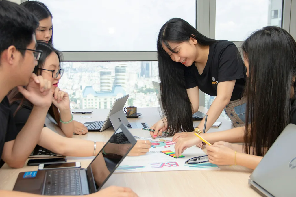 China-based team collaborating around project materials